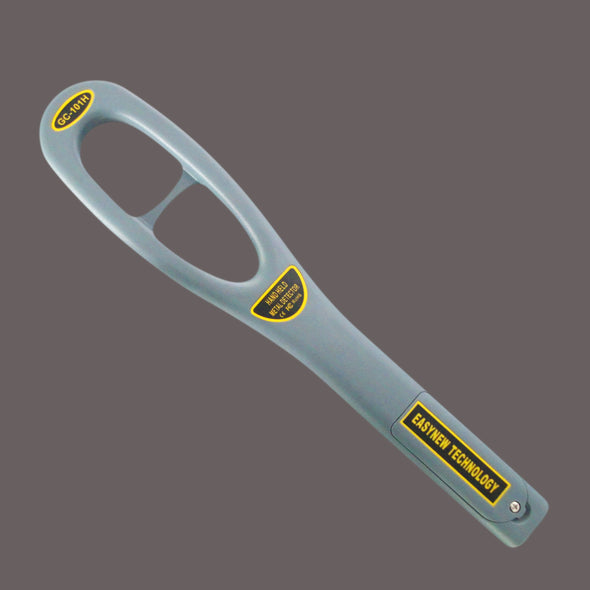 Picture of the back side of a grey loop hand-held security metal detector, crossing diagonally form the top left to the bottom right corner. The upper half coil loop portion joins at the shaft, which ends with a battery cover, closed with a screw. GC-101H model number, Easy technology, and CE approval logo appear in yellow on black at the top, center and on the battery cover, respectively.