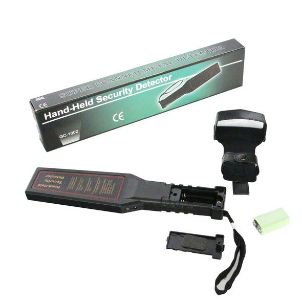 Picture of box above a hand-held safety metal detector device’s instructions side. The box, petroleum green at the centre, shading to black at both edges, is seen from a front, downward angle, showing the top. It displays “CE” and “SUPER SCANNER METAL DETECTOR”, “HAND-HELD SECURITY DETECTOR”, model number, “CE” and a picture of the detector to the right. The end of the detector shaft is open, and surrounded clockwise from the top by a holster, a 9 V battery and its cover.